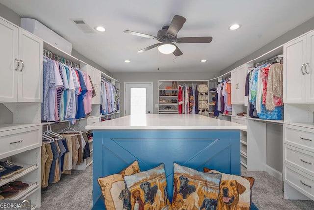 1985 Roscoe Rd, Newnan, GA 30263 - walk in closet with visible vents, ceiling fan, and light carpet