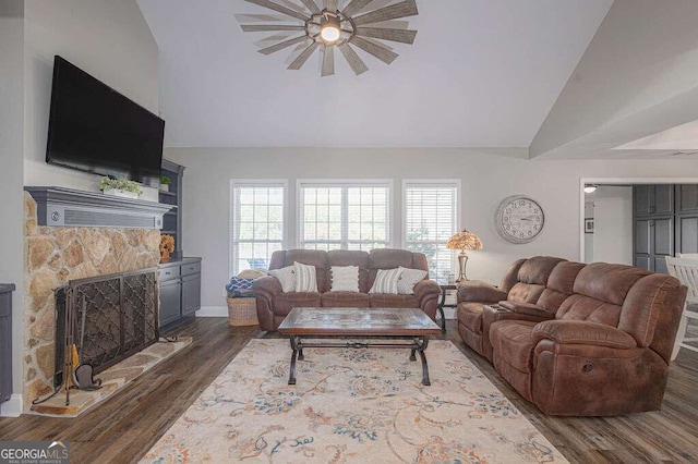 1985 Roscoe Rd, Newnan, GA 30263 - living area featuring vaulted ceiling, wood finished floors, and a stone fireplace