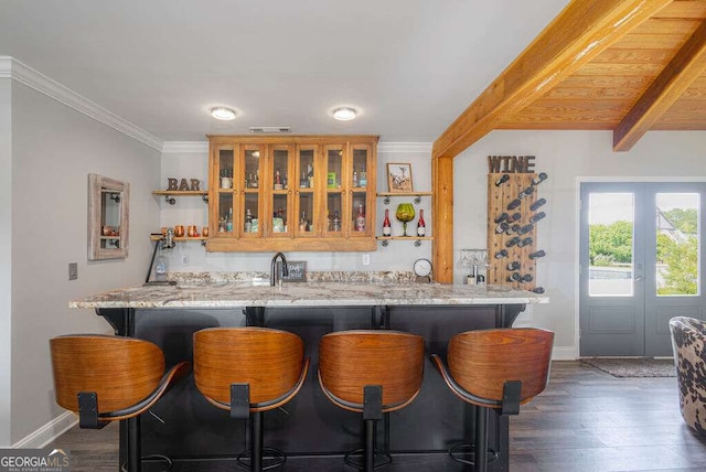 1985 Roscoe Rd, Newnan, GA 30263 - kitchen with visible vents, dark wood-type flooring, a kitchen bar, open shelves, and beam ceiling