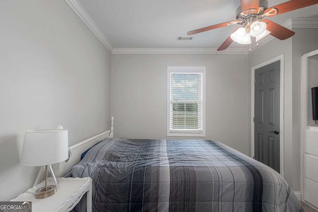 1985 Roscoe Rd, Newnan, GA 30263 - bedroom featuring ceiling fan, visible vents, and ornamental molding