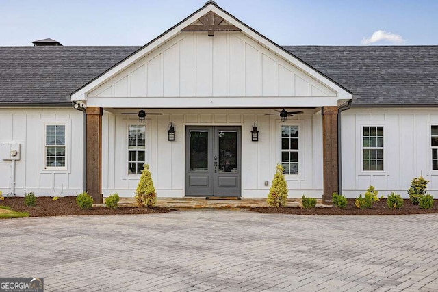 1985 Roscoe Rd, Newnan, GA 30263 - modern inspired farmhouse featuring roof with shingles, a porch, and board and batten siding