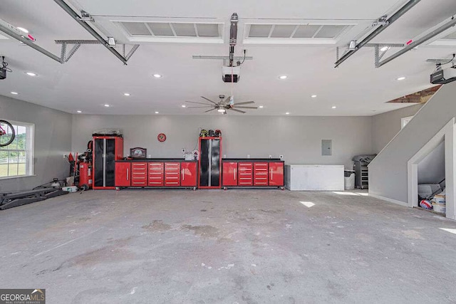 1985 Roscoe Rd, Newnan, GA 30263 - garage with visible vents, recessed lighting, freestanding refrigerator, and a garage door opener