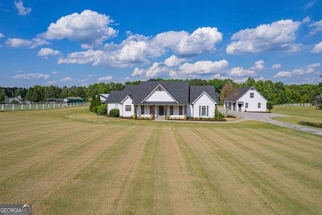 1985 Roscoe Rd, Newnan, GA 30263 - view of front of house with fence and a front lawn