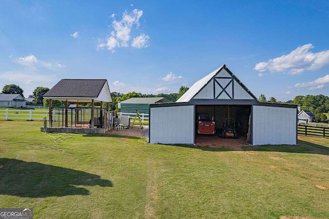 1985 Roscoe Rd, Newnan, GA 30263 - view of pole building featuring a yard and fence