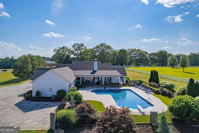 1985 Roscoe Rd, Newnan, GA 30263 - view of pool with a fenced in pool, fence private yard, a patio area, and a lawn