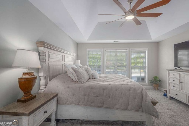 1985 Roscoe Rd, Newnan, GA 30263 - bedroom with ceiling fan, baseboards, a raised ceiling, and light colored carpet