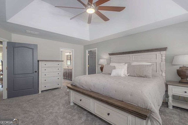 1985 Roscoe Rd, Newnan, GA 30263 - carpeted bedroom featuring a ceiling fan, visible vents, and ensuite bath