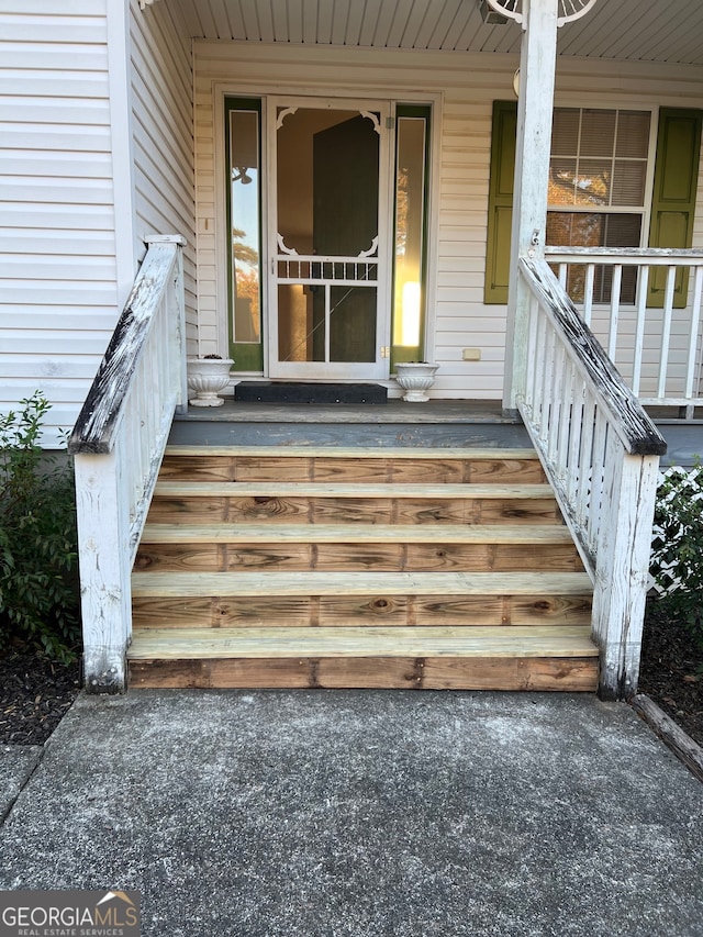 entrance to property with a porch