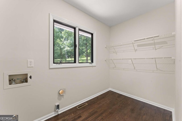 laundry room with wood-type flooring, electric dryer hookup, and washer hookup