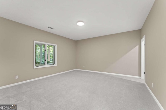 empty room featuring carpet flooring