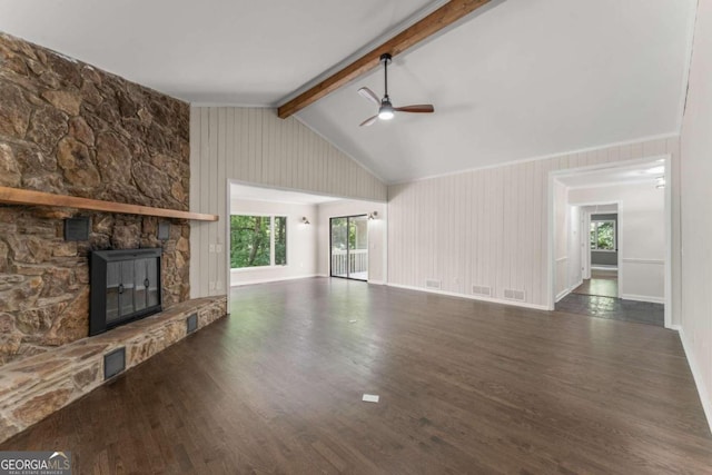 unfurnished living room with beamed ceiling, a fireplace, ceiling fan, and dark hardwood / wood-style flooring