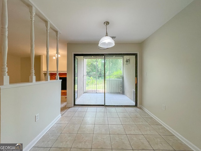 interior space with light tile patterned floors