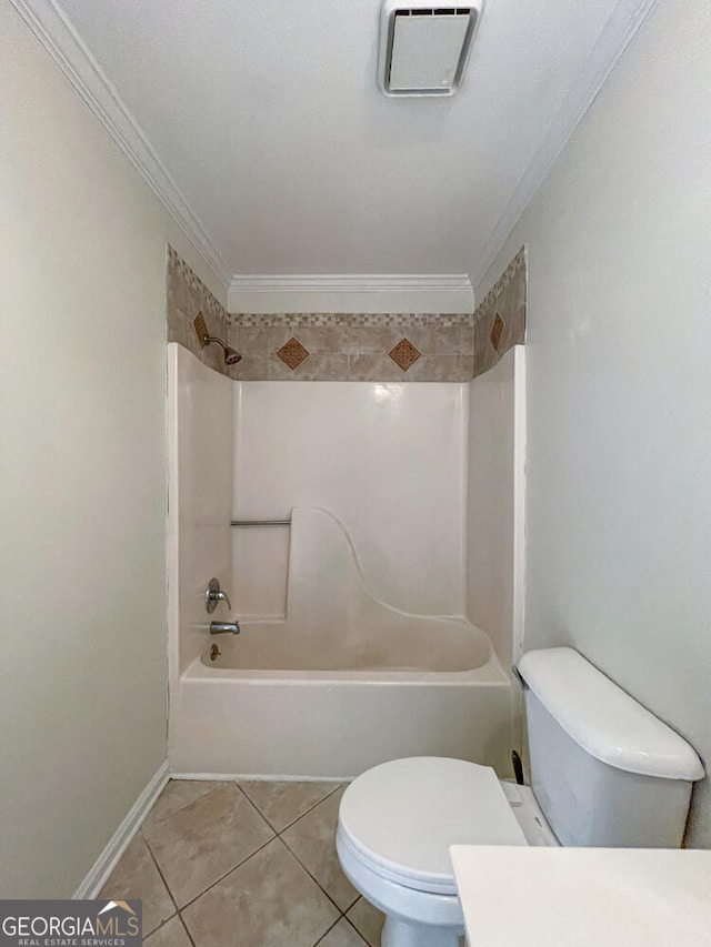 bathroom featuring tile patterned floors, shower / bath combination, toilet, and ornamental molding