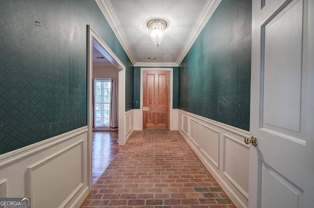 doorway featuring crown molding