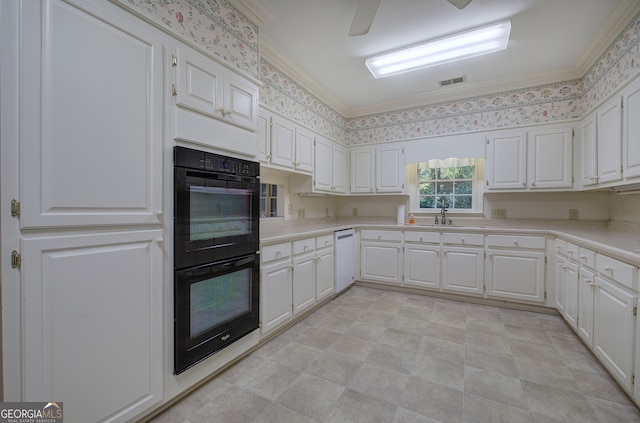 kitchen with white dishwasher, sink, white cabinets, and black double oven