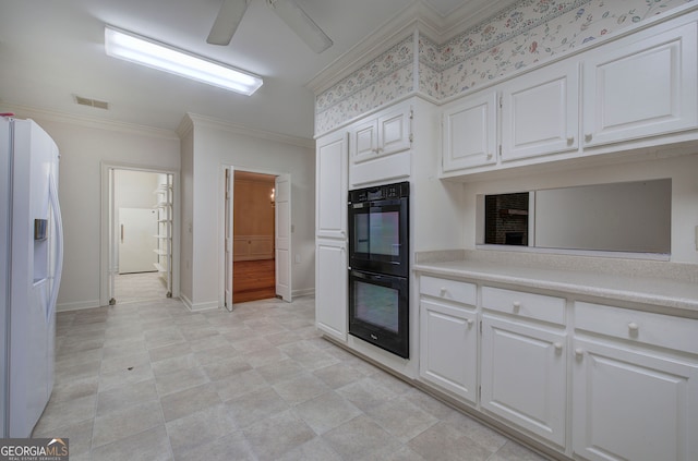 kitchen featuring white fridge with ice dispenser, ceiling fan, white cabinets, crown molding, and black double oven