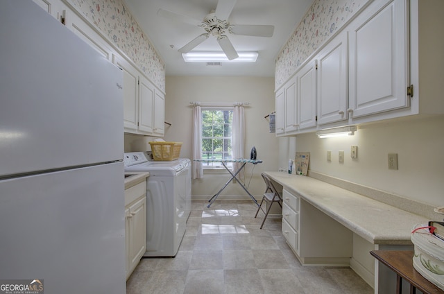 laundry area featuring cabinets, washer and dryer, and ceiling fan