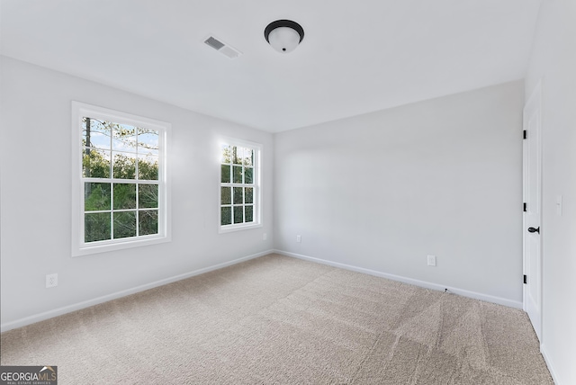 spare room with carpet flooring