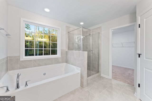 bathroom with independent shower and bath