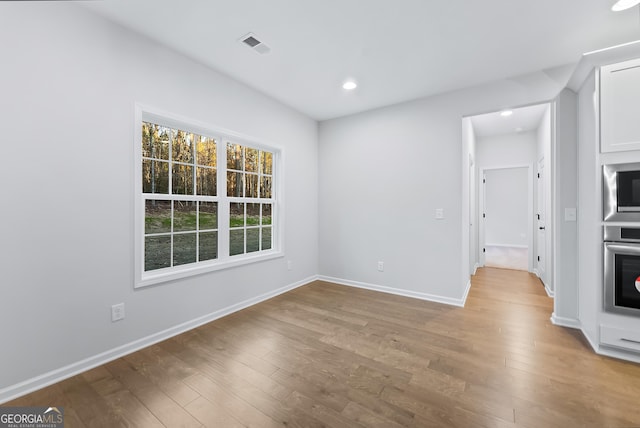 empty room featuring light hardwood / wood-style flooring