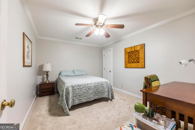 bedroom featuring ornamental molding, ceiling fan, and light colored carpet