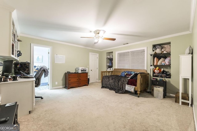 101 Huntington Dr, Dublin, GA 31021 - bedroom featuring crown molding, a ceiling fan, visible vents, carpet flooring, and baseboards