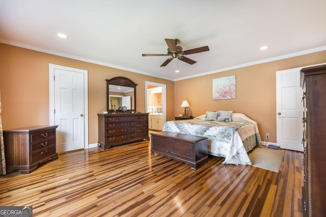 101 Huntington Dr, Dublin, GA 31021 - bedroom featuring wood finished floors, crown molding, recessed lighting, ceiling fan, and ensuite bathroom