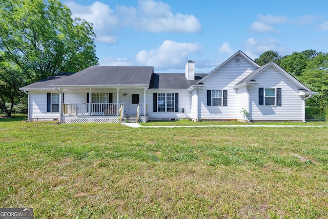 ranch-style home with a front yard and a porch