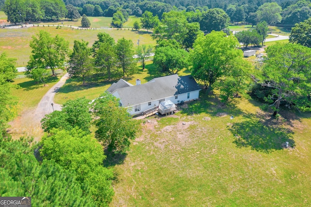 birds eye view of property with a rural view