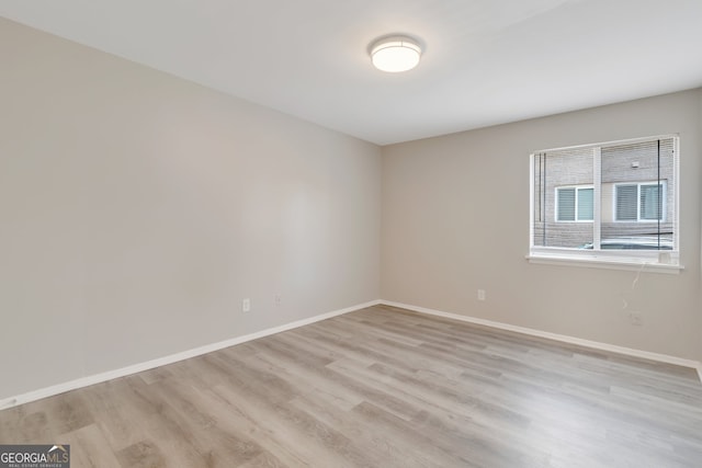 empty room with light wood-type flooring