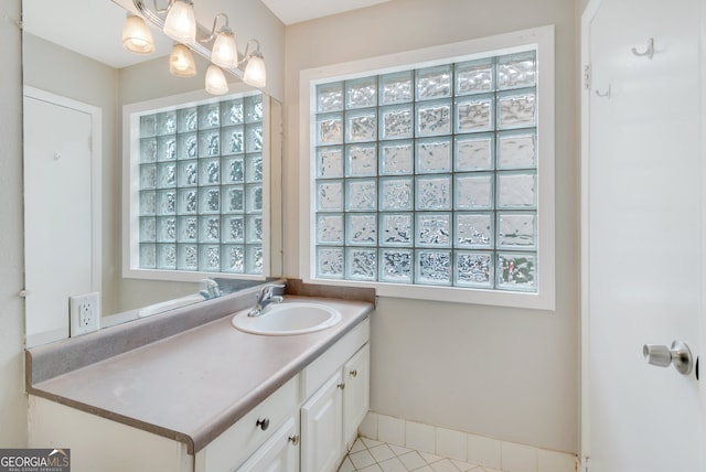 bathroom featuring tile patterned floors and vanity