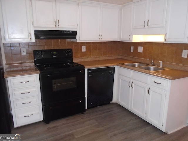 kitchen with white cabinetry, sink, dark hardwood / wood-style floors, and black appliances