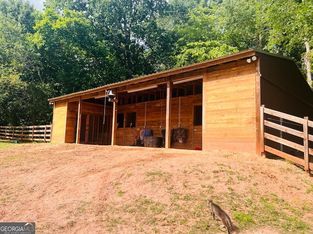 view of stable with an outdoor structure