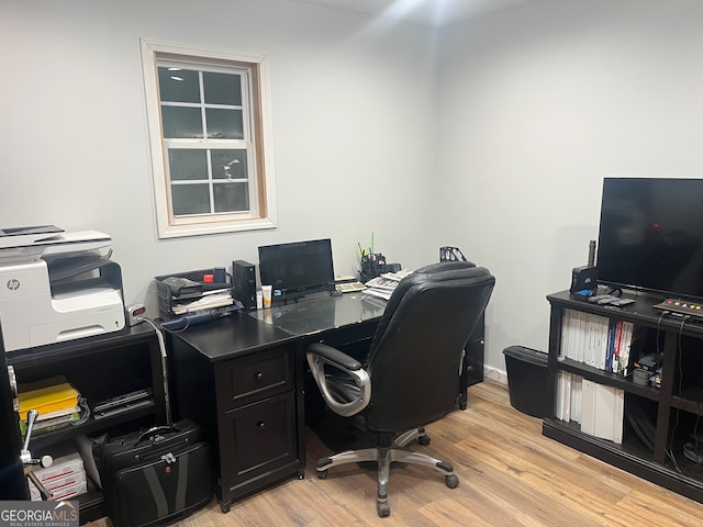 office space featuring light hardwood / wood-style floors