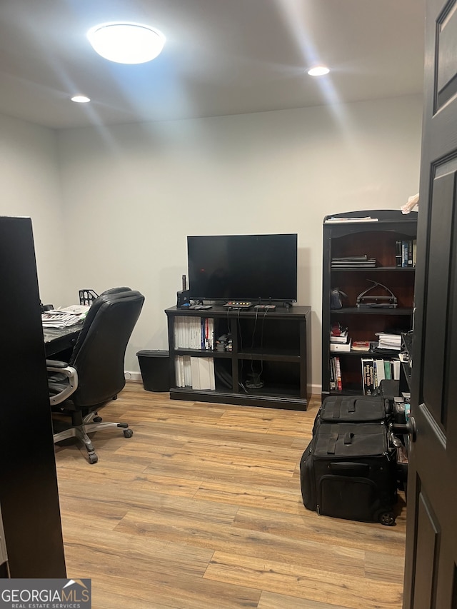 office area with light wood-type flooring