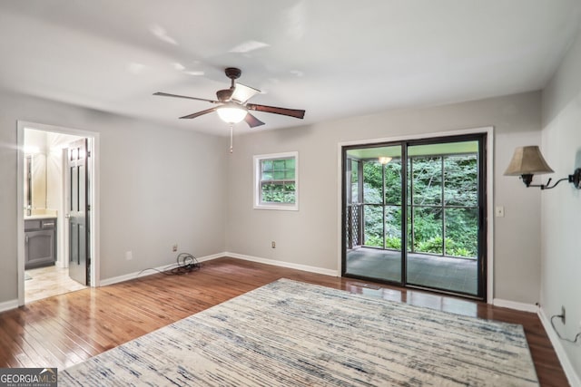 spare room featuring ceiling fan and wood-type flooring