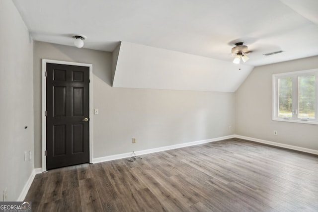 additional living space featuring ceiling fan, hardwood / wood-style floors, and lofted ceiling