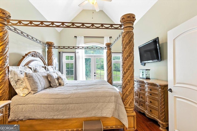 bedroom with ceiling fan, lofted ceiling, dark hardwood / wood-style floors, and multiple windows