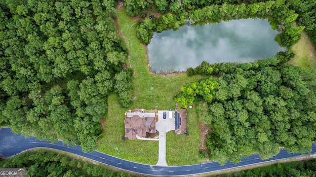 birds eye view of property featuring a water view