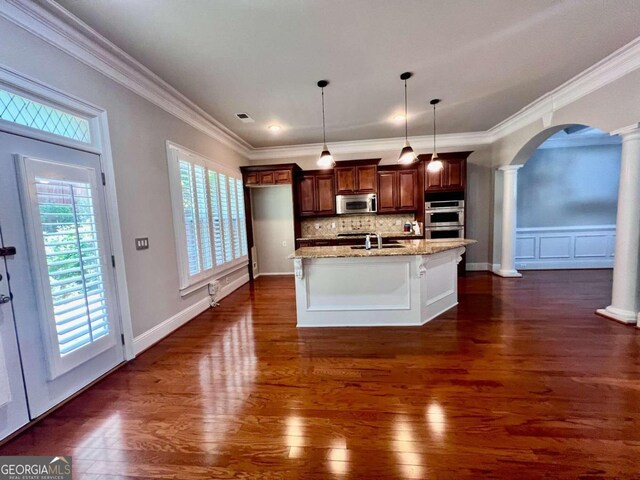 washroom featuring cabinets, electric dryer hookup, tile flooring, washer hookup, and sink