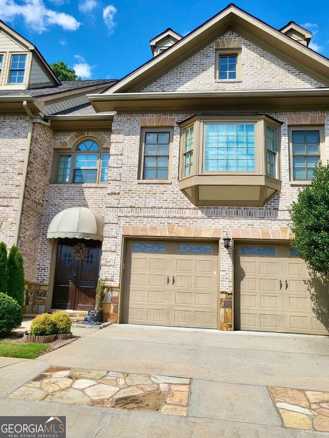 view of property featuring a garage