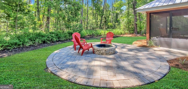 view of patio / terrace featuring a fire pit