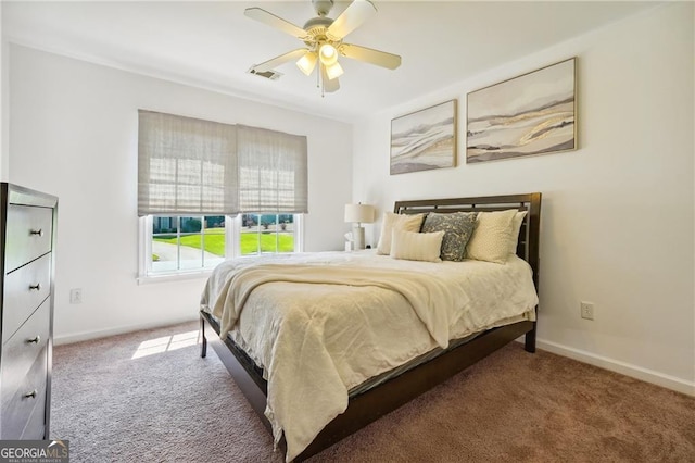 bedroom featuring ceiling fan and carpet floors