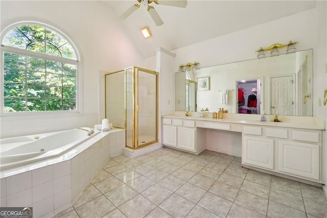 bathroom featuring ceiling fan, high vaulted ceiling, tile patterned flooring, and separate shower and tub