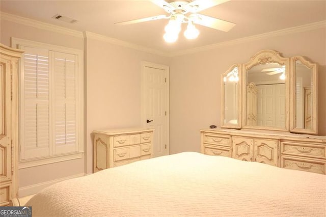 bedroom with crown molding and ceiling fan