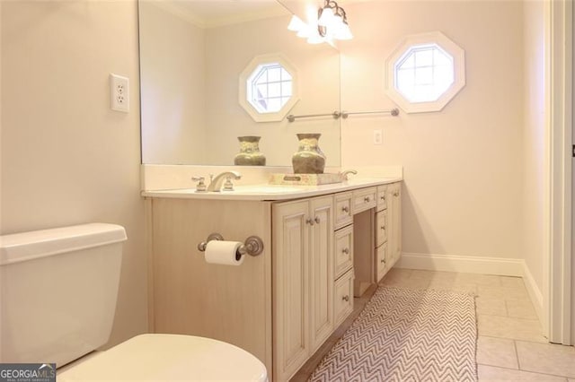 bathroom featuring tile flooring, oversized vanity, and toilet