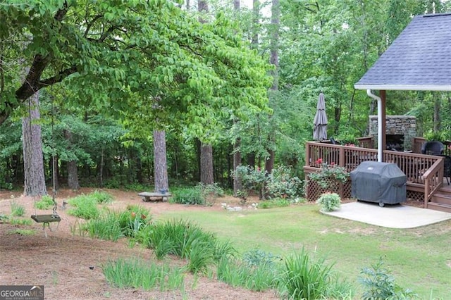 view of yard featuring a deck