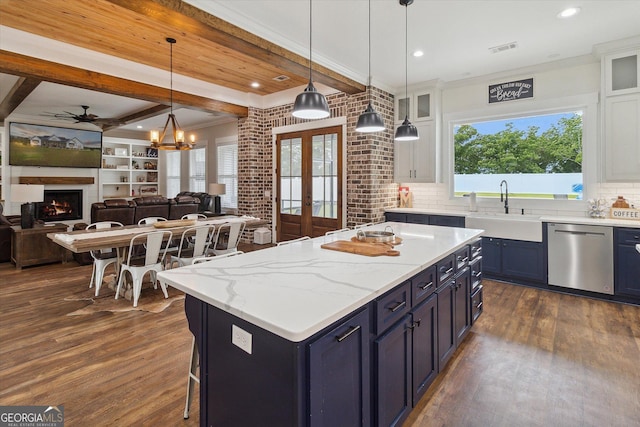 2879 Lakeview Rd, Statesboro, GA 30461 - kitchen with dishwasher, a sink, dark wood-type flooring, beamed ceiling, and a warm lit fireplace