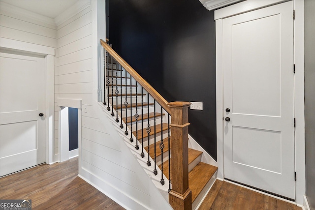 2879 Lakeview Rd, Statesboro, GA 30461 - stairway featuring wood finished floors, baseboards, and wood walls