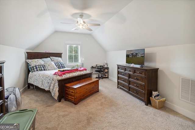 2879 Lakeview Rd, Statesboro, GA 30461 - bedroom featuring light carpet, vaulted ceiling, a ceiling fan, and baseboards